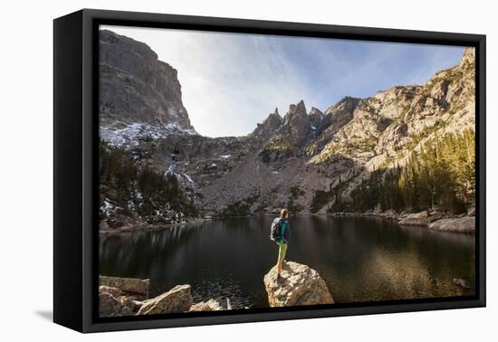 Rocky Mountain National Park, Colorado: An Adult Male Stands Alongside Emerald Lake-Ian Shive-Framed Stretched Canvas