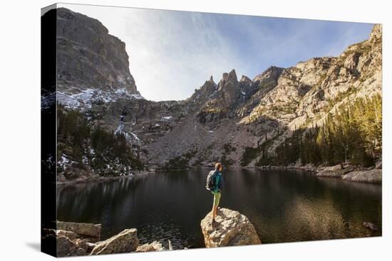 Rocky Mountain National Park, Colorado: An Adult Male Stands Alongside Emerald Lake-Ian Shive-Stretched Canvas