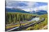 Rocky Mountaineer Train at Morant's Curve Near Lake Louise in the Canadian Rockies-Neale Clark-Stretched Canvas