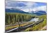 Rocky Mountaineer Train at Morant's Curve Near Lake Louise in the Canadian Rockies-Neale Clark-Mounted Photographic Print