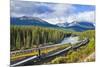 Rocky Mountaineer Train at Morant's Curve Near Lake Louise in the Canadian Rockies-Neale Clark-Mounted Photographic Print