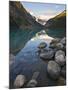 Rocky Mountains and Boulders Reflected in Lake Louise, Banff National Park, Alberta, Canada-Larry Ditto-Mounted Photographic Print