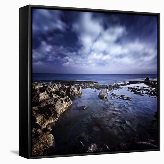 Rocky Shore and Tranquil Sea Against Cloudy Sky, Sardinia, Italy-null-Framed Stretched Canvas