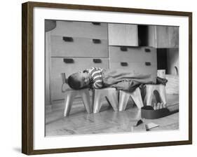 Rocky Stensrud, Jr., Using Children's Chairs in a Home to Make a Train Upon Which He Can Sleep-Joe Scherschel-Framed Photographic Print