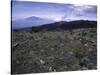Rocky Terrain with Mountain in the Distance, Kilimanjaro-Michael Brown-Stretched Canvas