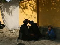 An Afghan Woman Clad in a Burqa Walks Next to a Taxi in Kabul, Afghanistan, Wednesday, June 7, 2006-Rodrigo Abd-Photographic Print