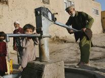 An Elderly Man Pumps Water from a Public Well in Kabul, Afghanistan, Friday, September 22, 2006-Rodrigo Abd-Photographic Print