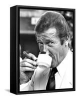 Roger Moore Drinking Coffee-Associated Newspapers-Framed Stretched Canvas