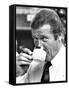 Roger Moore Drinking Coffee-Associated Newspapers-Framed Stretched Canvas