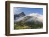 Rolling fog clouds with Heavy Runner and Reynold Mountains at Logan Pass in Glacier National Park-Chuck Haney-Framed Photographic Print