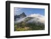 Rolling fog clouds with Heavy Runner and Reynold Mountains at Logan Pass in Glacier National Park-Chuck Haney-Framed Photographic Print