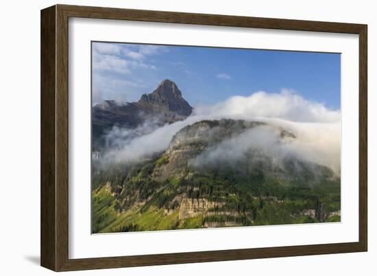 Rolling fog clouds with Heavy Runner and Reynold Mountains at Logan Pass in Glacier National Park-Chuck Haney-Framed Photographic Print