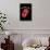 Rolling Stones - Classic Logo-Trends International-Framed Poster displayed on a wall