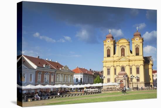 Roman Catholic Cathedral and Outdoor Cafes in Piata Unirii, Timisoara, Banat, Romania, Europe-Ian Trower-Stretched Canvas