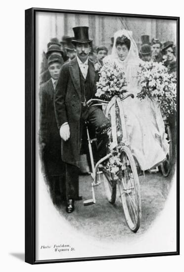 Roman Catholic Couple Leaving Notre Dame De France, Leicester Square, on Bicycles-null-Framed Photographic Print