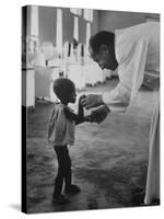 Roman Catholic Priest Chatting with Healing Child-Terence Spencer-Stretched Canvas