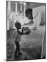 Roman Catholic Priest Chatting with Healing Child-Terence Spencer-Mounted Photographic Print