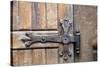 Romania. Brasov. Detail of church exterior. Wood door hinge.-Emily Wilson-Stretched Canvas