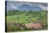 Romania, Transylvania, Bran, House and Bucegi Mountains, Spring-Walter Bibikow-Stretched Canvas