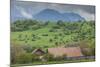 Romania, Transylvania, Bran, House and Bucegi Mountains, Spring-Walter Bibikow-Mounted Photographic Print