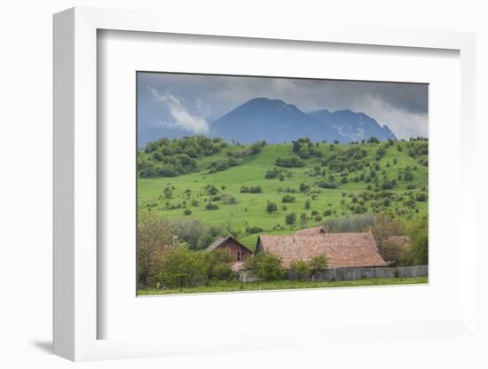 Romania, Transylvania, Bran, House and Bucegi Mountains, Spring-Walter Bibikow-Framed Photographic Print