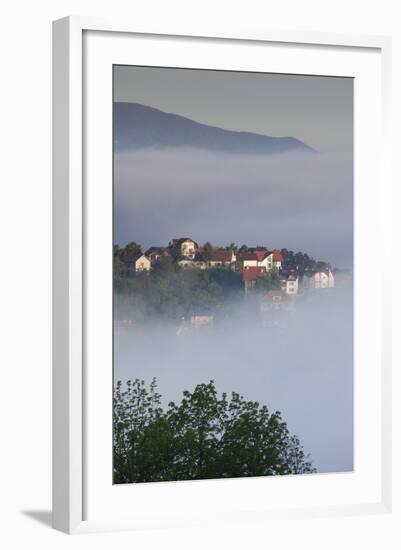 Romania, Transylvania, Brasov, Town Buildings in Fog, Dawn-Walter Bibikow-Framed Photographic Print