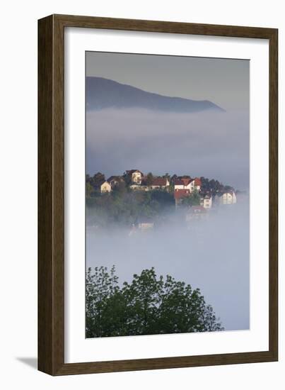 Romania, Transylvania, Brasov, Town Buildings in Fog, Dawn-Walter Bibikow-Framed Photographic Print