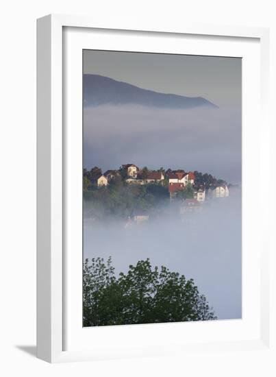 Romania, Transylvania, Brasov, Town Buildings in Fog, Dawn-Walter Bibikow-Framed Photographic Print