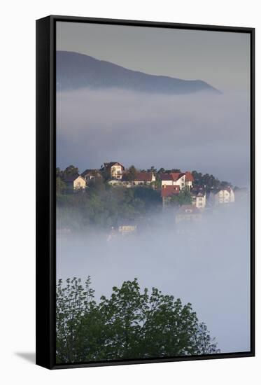 Romania, Transylvania, Brasov, Town Buildings in Fog, Dawn-Walter Bibikow-Framed Stretched Canvas