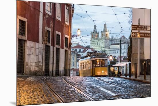 Romantic Atmosphere in Old Streets of Alfama with Castle in Background and Tram Number 28-Roberto Moiola-Mounted Premium Photographic Print