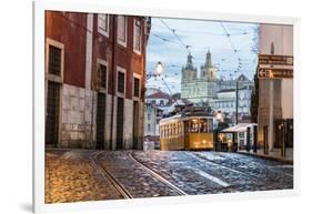 Romantic Atmosphere in Old Streets of Alfama with Castle in Background and Tram Number 28-Roberto Moiola-Framed Photographic Print