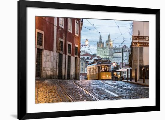 Romantic Atmosphere in Old Streets of Alfama with Castle in Background and Tram Number 28-Roberto Moiola-Framed Photographic Print