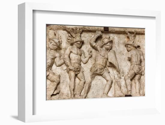 Rome, Italy. Bas relief in the Colosseum of gladiators fighting.-null-Framed Photographic Print