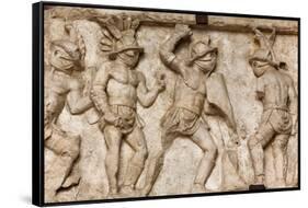 Rome, Italy. Bas relief in the Colosseum of gladiators fighting.-null-Framed Stretched Canvas