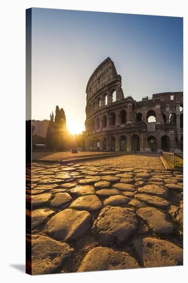 Rome, Lazio, Italy. Colosseum at Summer Sunrise.-Marco Bottigelli-Stretched Canvas