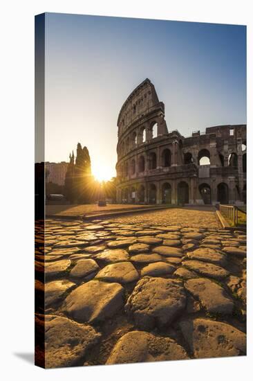 Rome, Lazio, Italy. Colosseum at Summer Sunrise.-Marco Bottigelli-Stretched Canvas