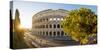 Rome, Lazio, Italy. High angle panoramic view over the Colosseum square at sunrise.-Marco Bottigelli-Stretched Canvas