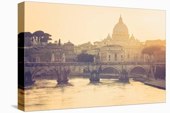 Rome, Lazio, Italy. St Angel Bridge at Sunset.-Marco Bottigelli-Stretched Canvas