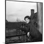 Romy Schneider on a Balcony-Marcel Begoin-Mounted Photographic Print