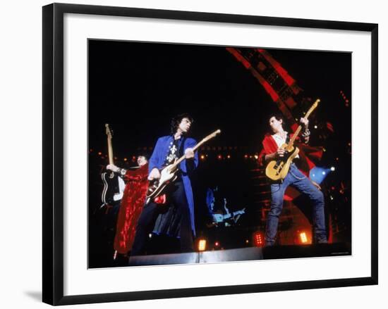 Ron Wood, Mick Jagger and Keith Richards During a Performance by the Rolling Stones-null-Framed Premium Photographic Print