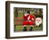 Ronald Guzman, Who Works as Santa Claus, Takes a Break in a Public Park in Lima, Peru-null-Framed Photographic Print