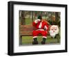 Ronald Guzman, Who Works as Santa Claus, Takes a Break in a Public Park in Lima, Peru-null-Framed Photographic Print