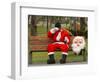 Ronald Guzman, Who Works as Santa Claus, Takes a Break in a Public Park in Lima, Peru-null-Framed Photographic Print