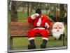 Ronald Guzman, Who Works as Santa Claus, Takes a Break in a Public Park in Lima, Peru-null-Mounted Photographic Print