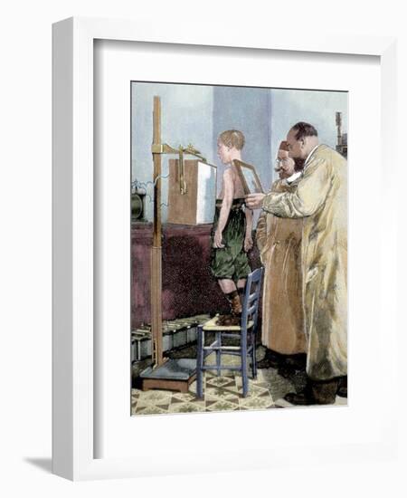 Rontgen, Wilhelm Conrad (1845-1923). German Physicist. Rontgen Exploring a Child with X-Ray Device-Tarker-Framed Giclee Print