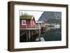 Rorbuer, traditional fishermnen's cottages now used for tourist accommodaton in Reine-Ellen Rooney-Framed Photographic Print