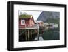 Rorbuer, traditional fishermnen's cottages now used for tourist accommodaton in Reine-Ellen Rooney-Framed Photographic Print