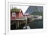 Rorbuer, traditional fishermnen's cottages now used for tourist accommodaton in Reine-Ellen Rooney-Framed Photographic Print