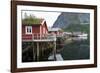 Rorbuer, traditional fishermnen's cottages now used for tourist accommodaton in Reine-Ellen Rooney-Framed Photographic Print