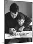 Rotolo Brothers Reading Book in Sicily After Cataract Operations Restored their Sight-Carlo Bavagnoli-Mounted Photographic Print